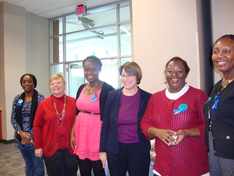 Sen. Amy Klobuchar, the commissioner and some board members of The Enitan Story